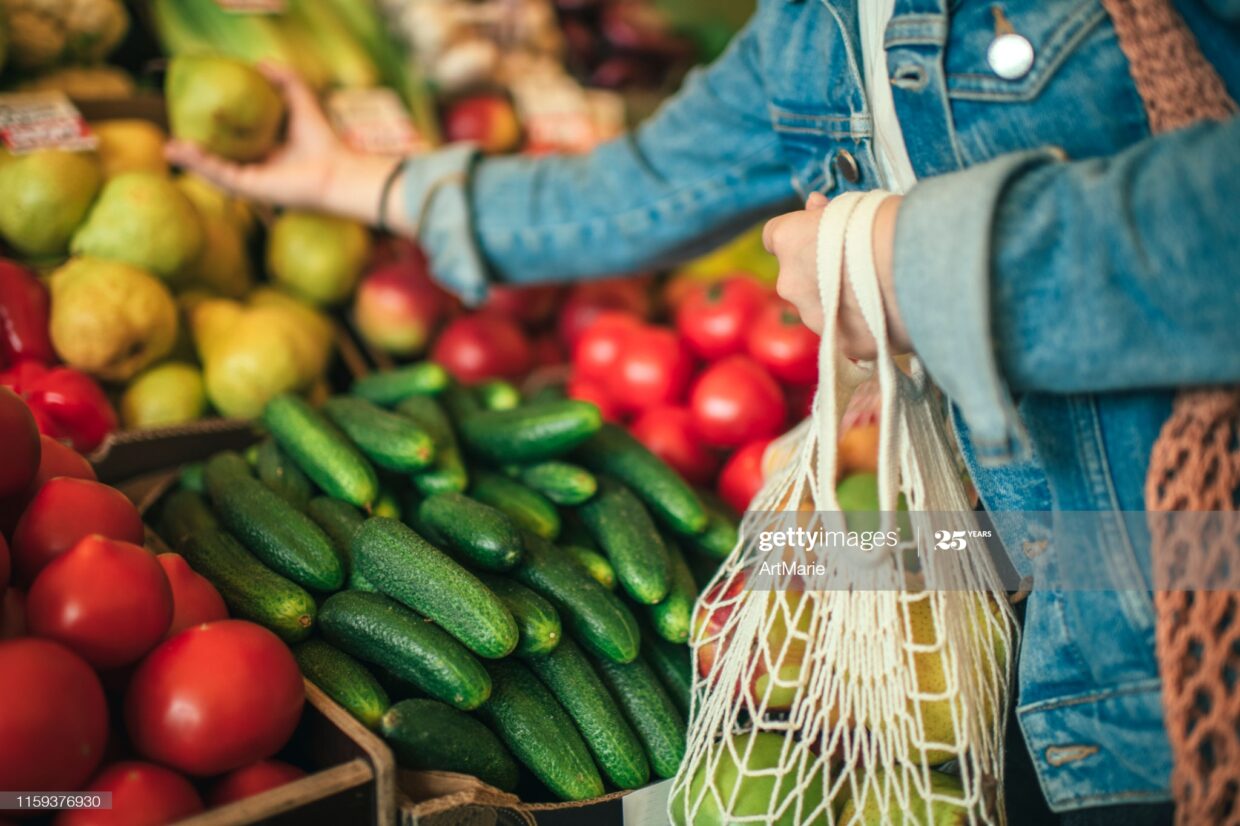 Close-up of ecologically friendly reusable bag with fruit and vegetables